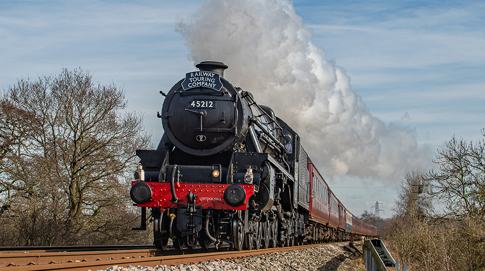 A steam engine shunting across the tracks for the Railway Touring Company